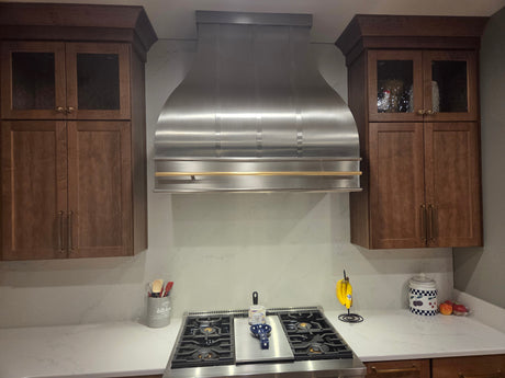 Molly & Pete’s Iowa Kitchen: A Custom Stainless Steel Range Hood With Brass Details